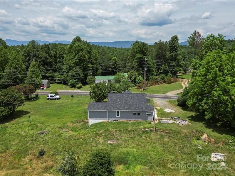 4080 Piney Road Morganton, NC 28655 - Photo 23 of 23 a view of a house with a yard and sitting area