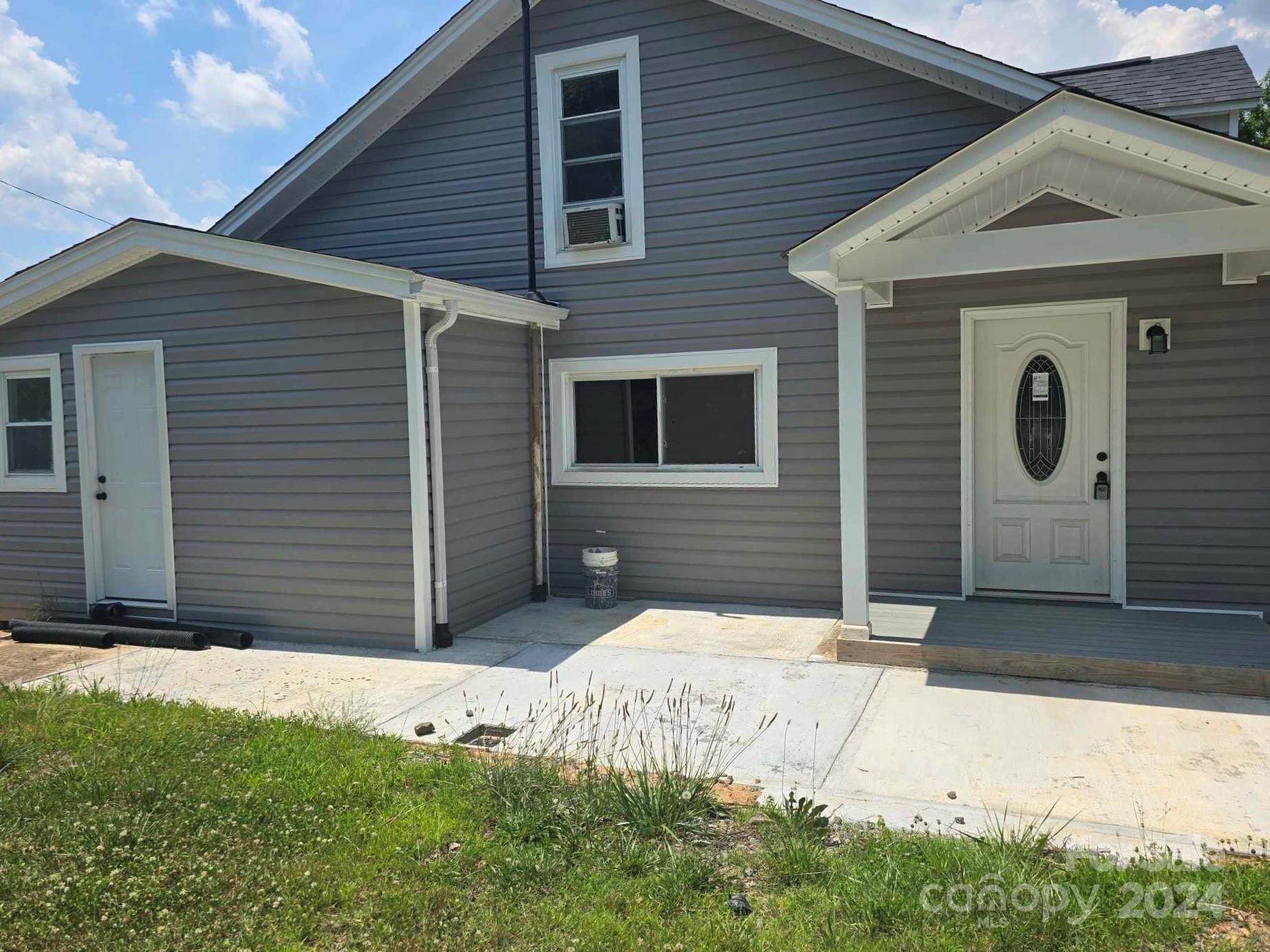 4080 Piney Road Morganton, NC 28655 - Photo 4 of 23 a front view of a house with a yard
