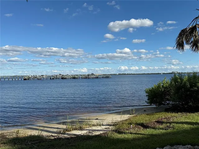 a view of a lake with a city