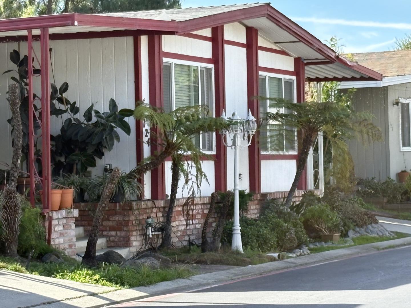 4271 North 1st Street, Unit 124 San Jose, CA 95134 - Photo 3 of 12 front view of a house with a street