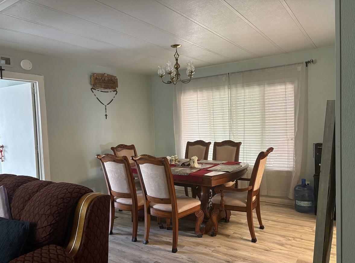 4271 North 1st Street, Unit 124 San Jose, CA 95134 - Photo 5 of 12 a view of a dining room with furniture and window