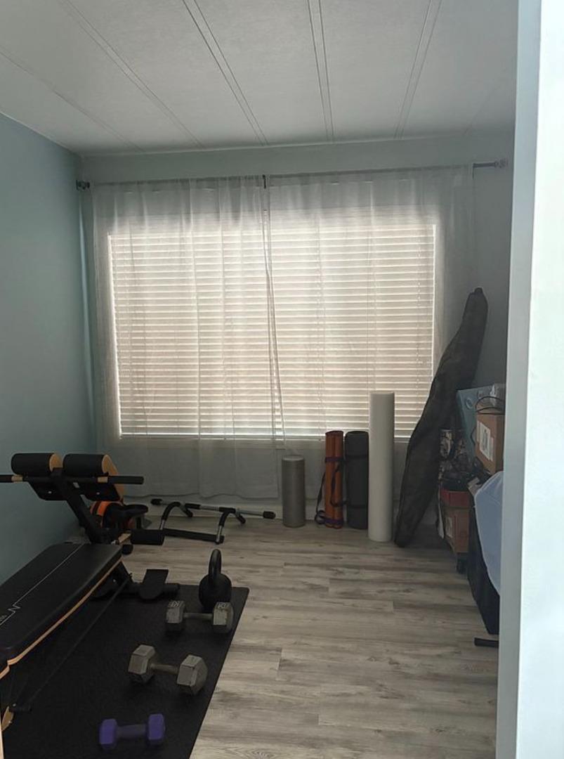 4271 North 1st Street, Unit 124 San Jose, CA 95134 - Photo 9 of 12 a room with furniture and a window