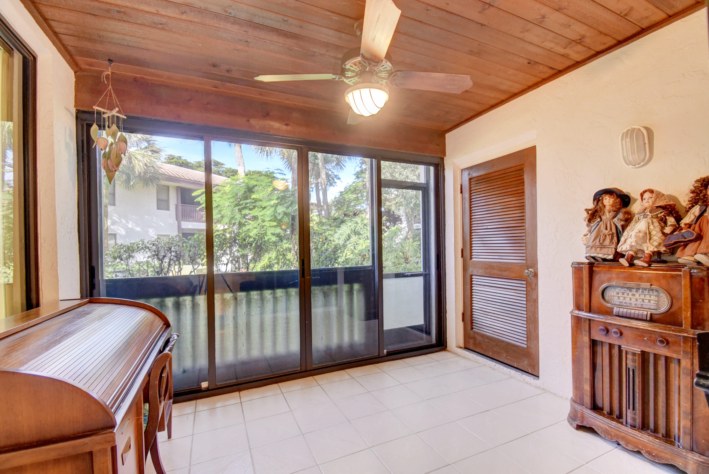 9246 Sable Ridge Circle, Unit A Boca Raton, FL 33428 - Photo 15 of 15 Florida Room with Garden View