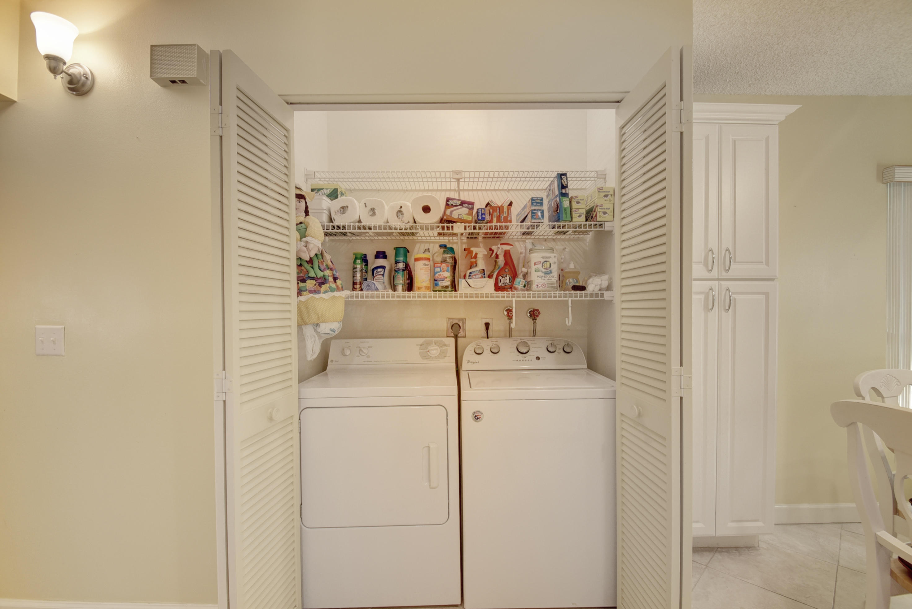 9246 Sable Ridge Circle, Unit A Boca Raton, FL 33428 - Photo 9 of 15 Pantry and Washer/Dryer