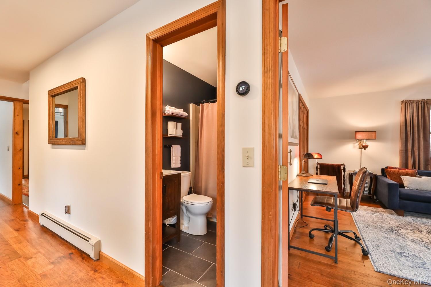 61 Mt View Estates Road Windham, NY 12496 - Photo 14 of 38 a view of bathroom with a sink and a mirror