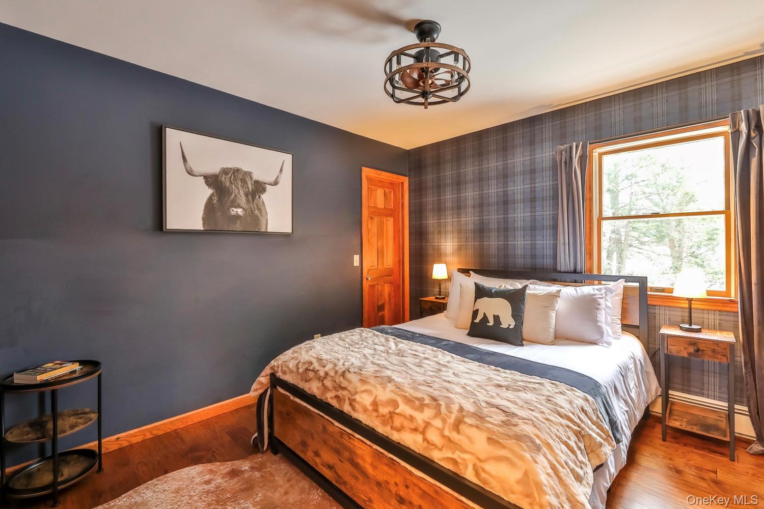 61 Mt View Estates Road Windham, NY 12496 - Photo 29 of 38 a bedroom with a bed and a window