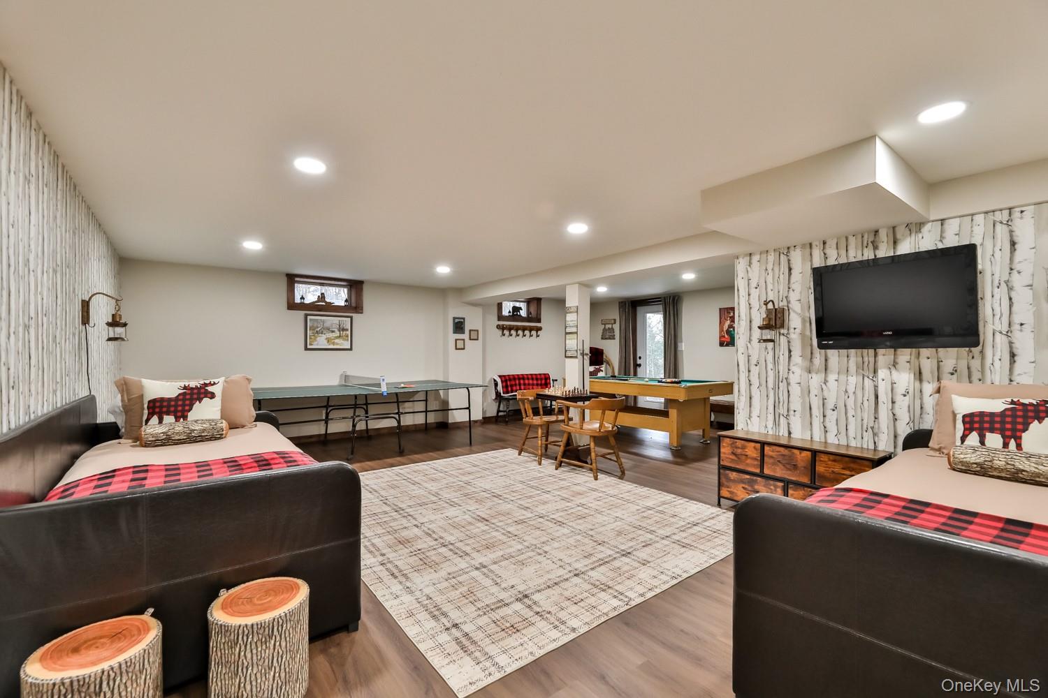 61 Mt View Estates Road Windham, NY 12496 - Photo 31 of 38 a living room with furniture and a flat screen tv