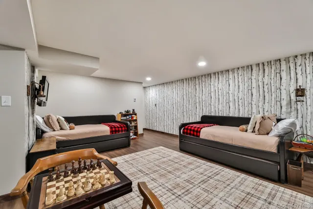 a bedroom with furniture and a couch