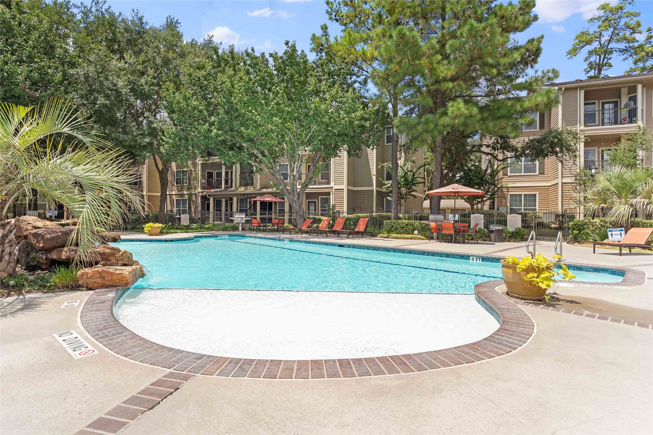 2400-731 Spring Rain Drive Spring, TX 77379 - Photo 28 of 33 a view of a house with a swimming pool