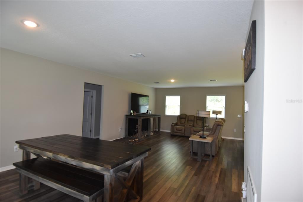 14241 Ravine Avenue Weeki Wachee, FL 34614 - Photo 4 of 48 a living room with furniture and a table