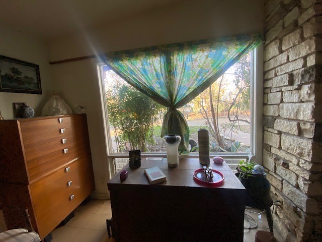 905 Neans Drive Austin, TX 78758 - Photo 14 of 40 a dining room with furniture and window