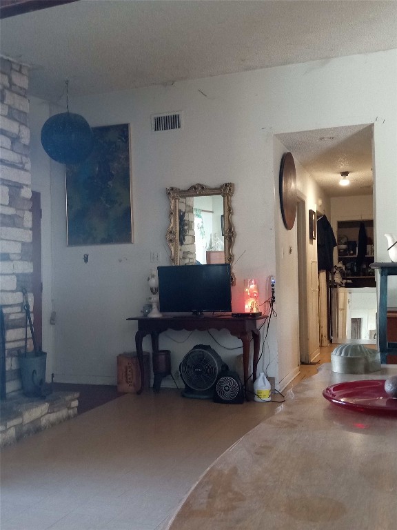 905 Neans Drive Austin, TX 78758 - Photo 22 of 40 a living room with furniture and a fireplace