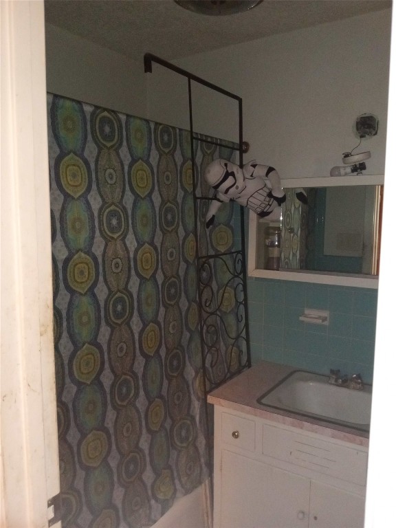 905 Neans Drive Austin, TX 78758 - Photo 25 of 40 a utility room with a shower and vanity