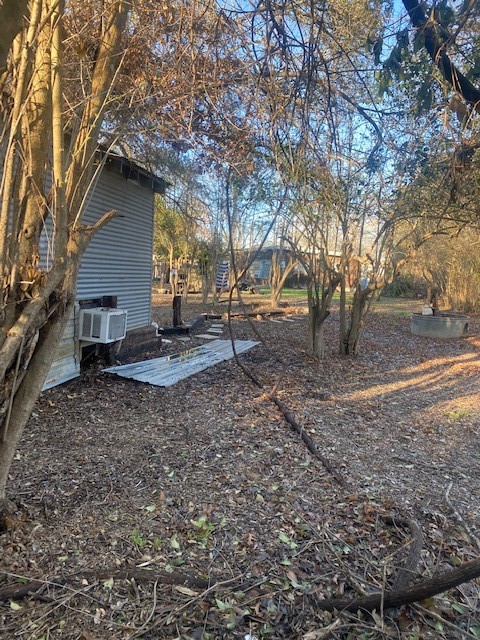 905 Neans Drive Austin, TX 78758 - Photo 32 of 40 a house view with a backyard space