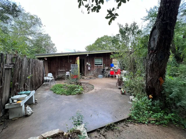 a garden view with a seating space