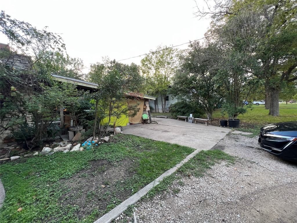 905 Neans Drive Austin, TX 78758 - Photo 10 of 40 a view of street with trees and some trees