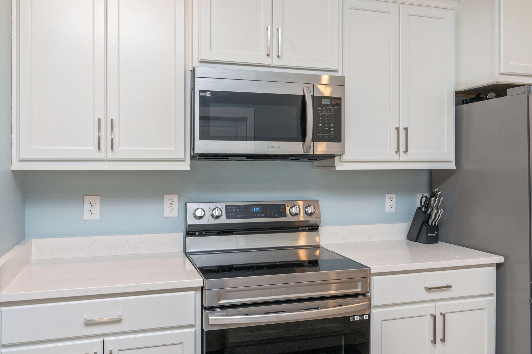 109 Blooming Cove Crestview, FL 32539 - Photo 15 of 42 a kitchen with appliances and cabinets