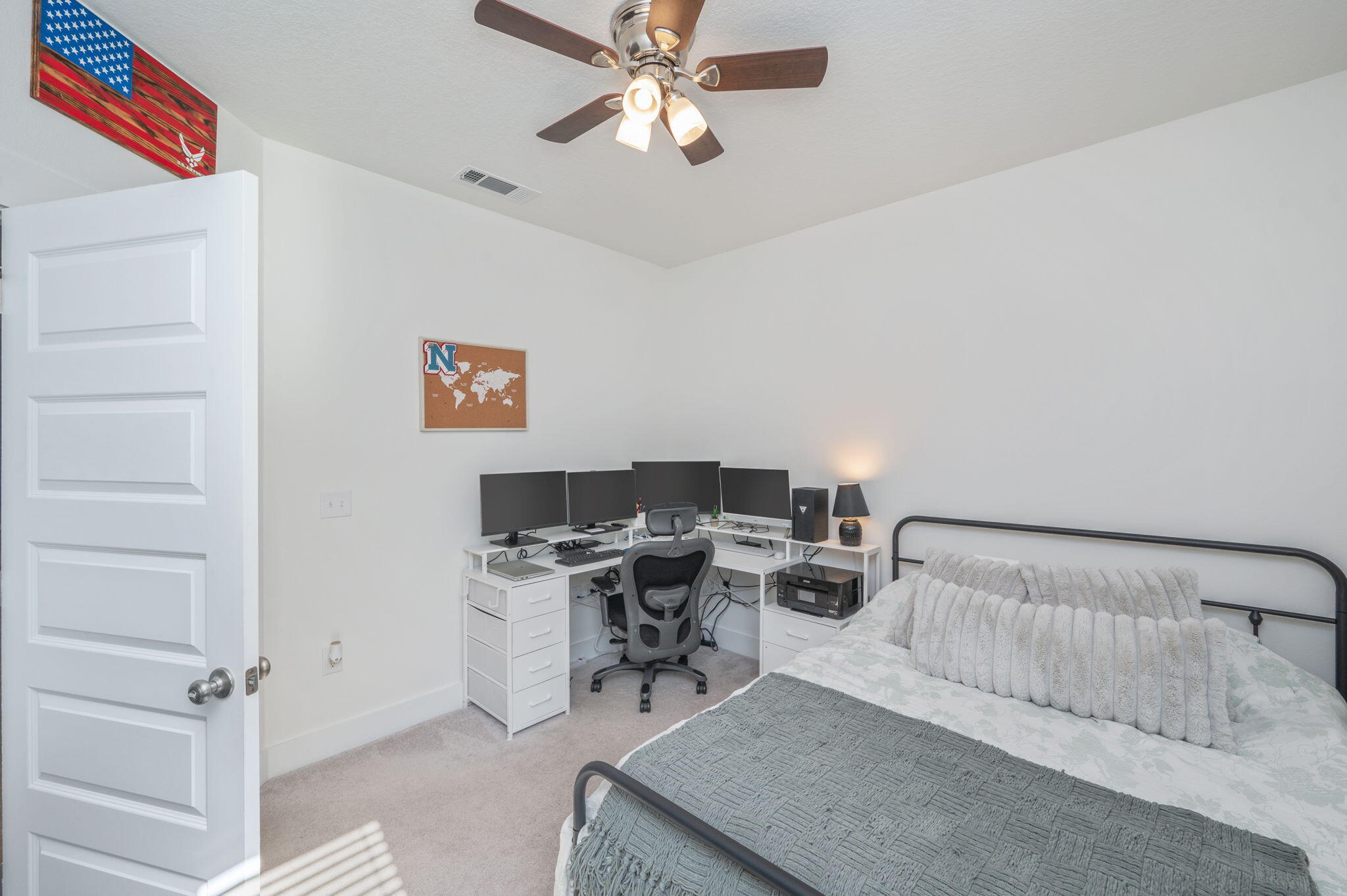 109 Blooming Cove Crestview, FL 32539 - Photo 19 of 42 a bedroom with a bed and a desk