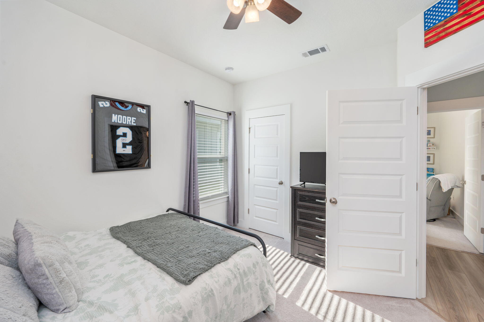 109 Blooming Cove Crestview, FL 32539 - Photo 20 of 42 a bedroom with a bed and a walk in closet