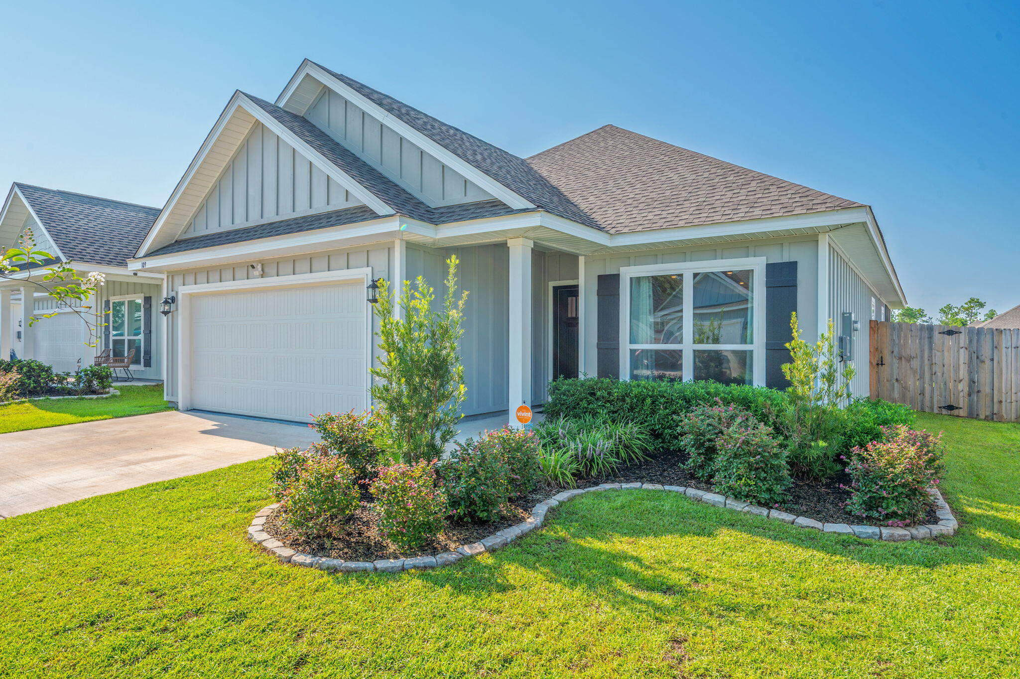 109 Blooming Cove Crestview, FL 32539 - Photo 2 of 42 a view of a house with a garden and plants