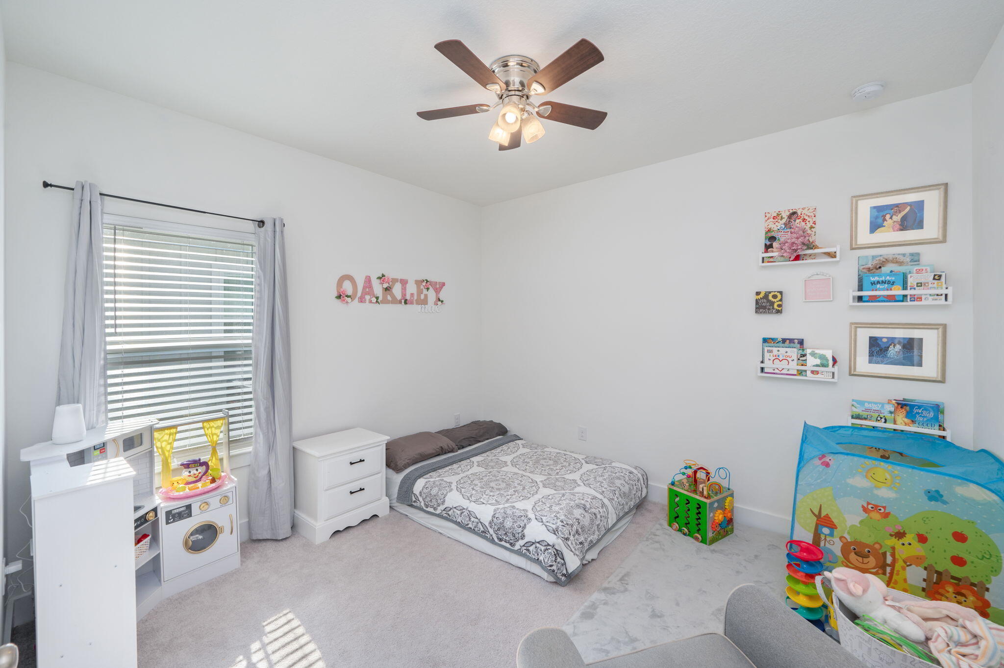 109 Blooming Cove Crestview, FL 32539 - Photo 21 of 42 a bedroom with a bed a window and a dresser