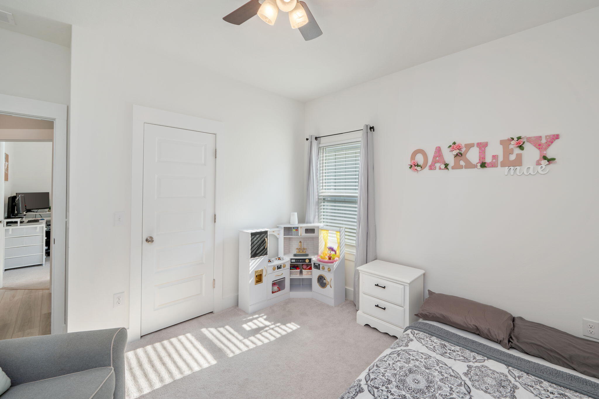 109 Blooming Cove Crestview, FL 32539 - Photo 23 of 42 a bedroom with furniture and a rug