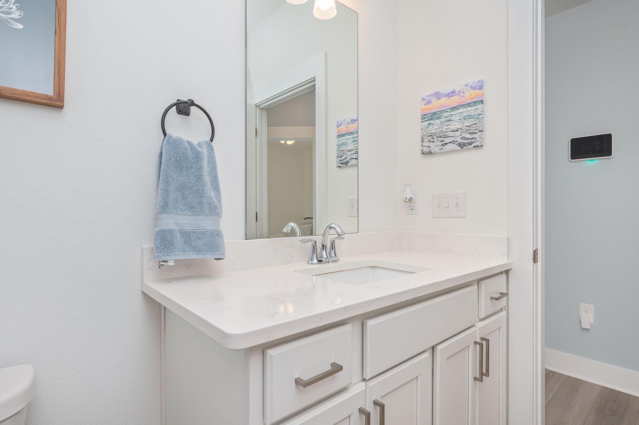109 Blooming Cove Crestview, FL 32539 - Photo 26 of 42 a bathroom with a sink and a mirror