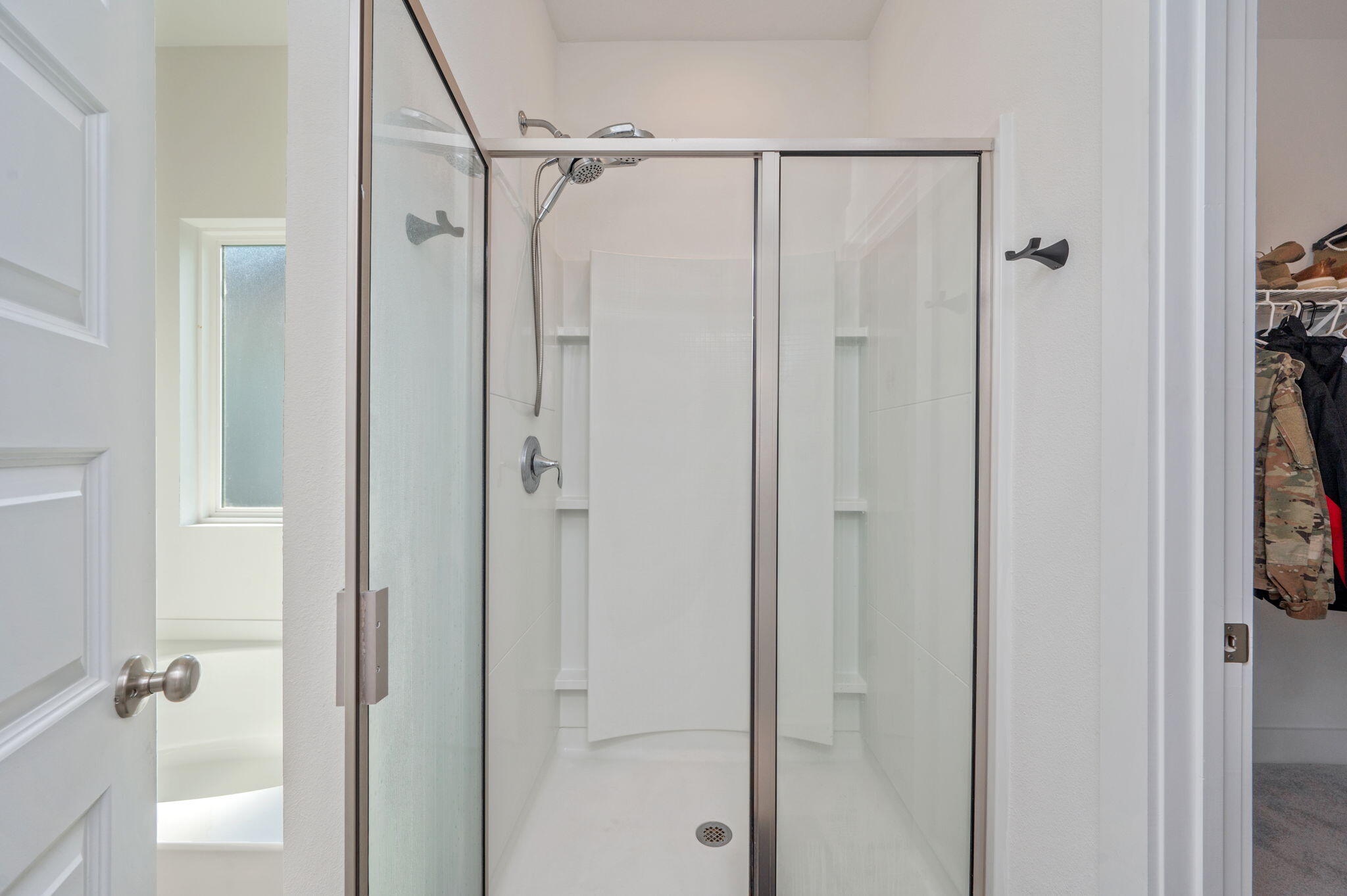 109 Blooming Cove Crestview, FL 32539 - Photo 32 of 42 a bathroom with a glass shower door