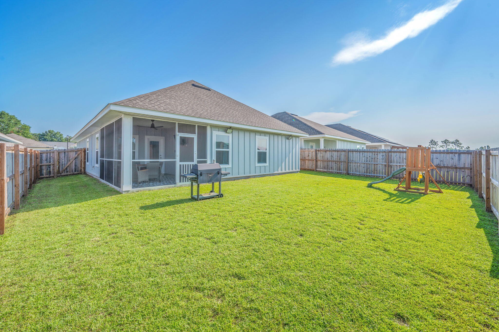 109 Blooming Cove Crestview, FL 32539 - Photo 38 of 42 a view of a house with a yard and sitting area