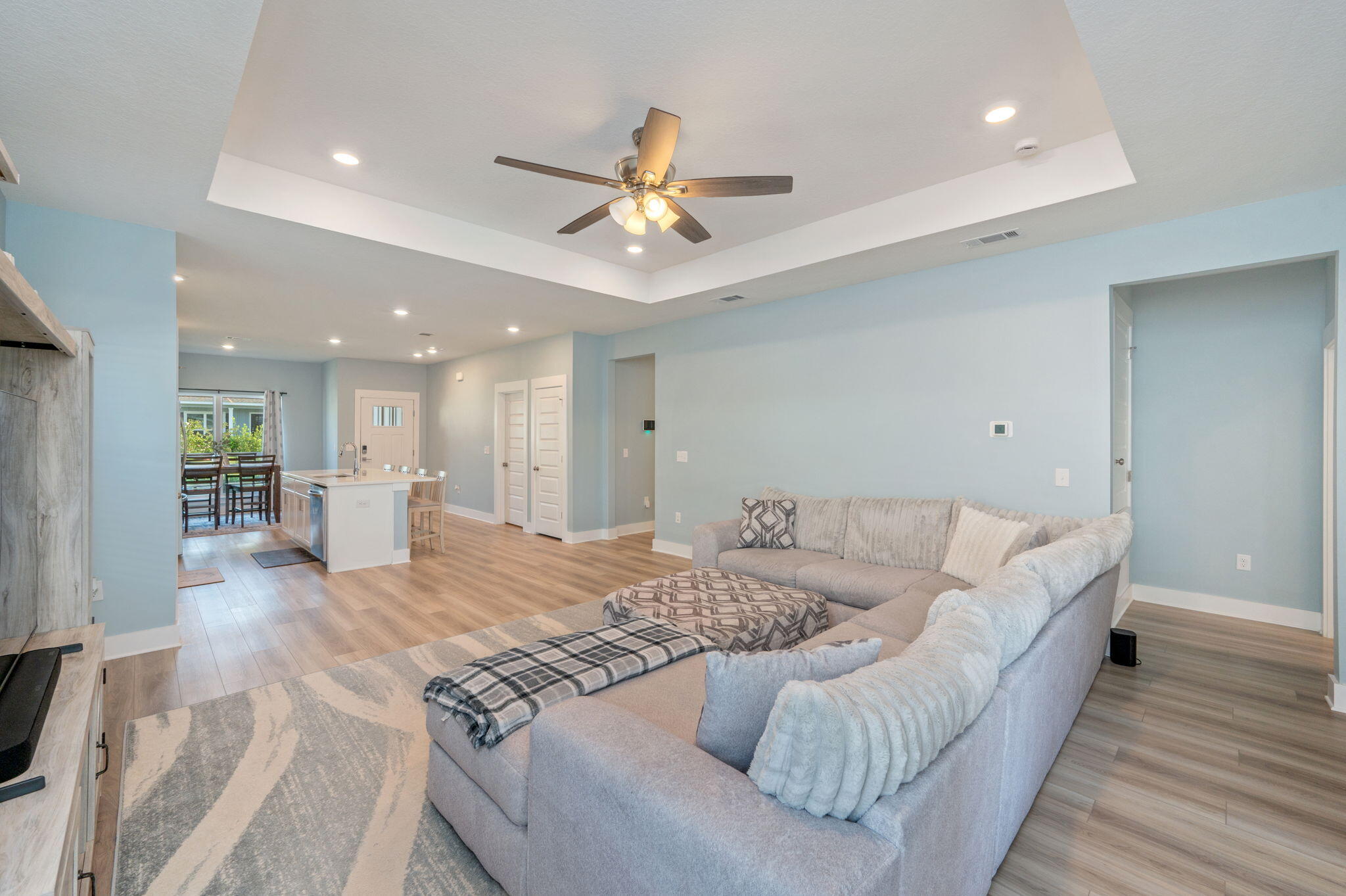 109 Blooming Cove Crestview, FL 32539 - Photo 8 of 42 a living room with furniture and a chandelier