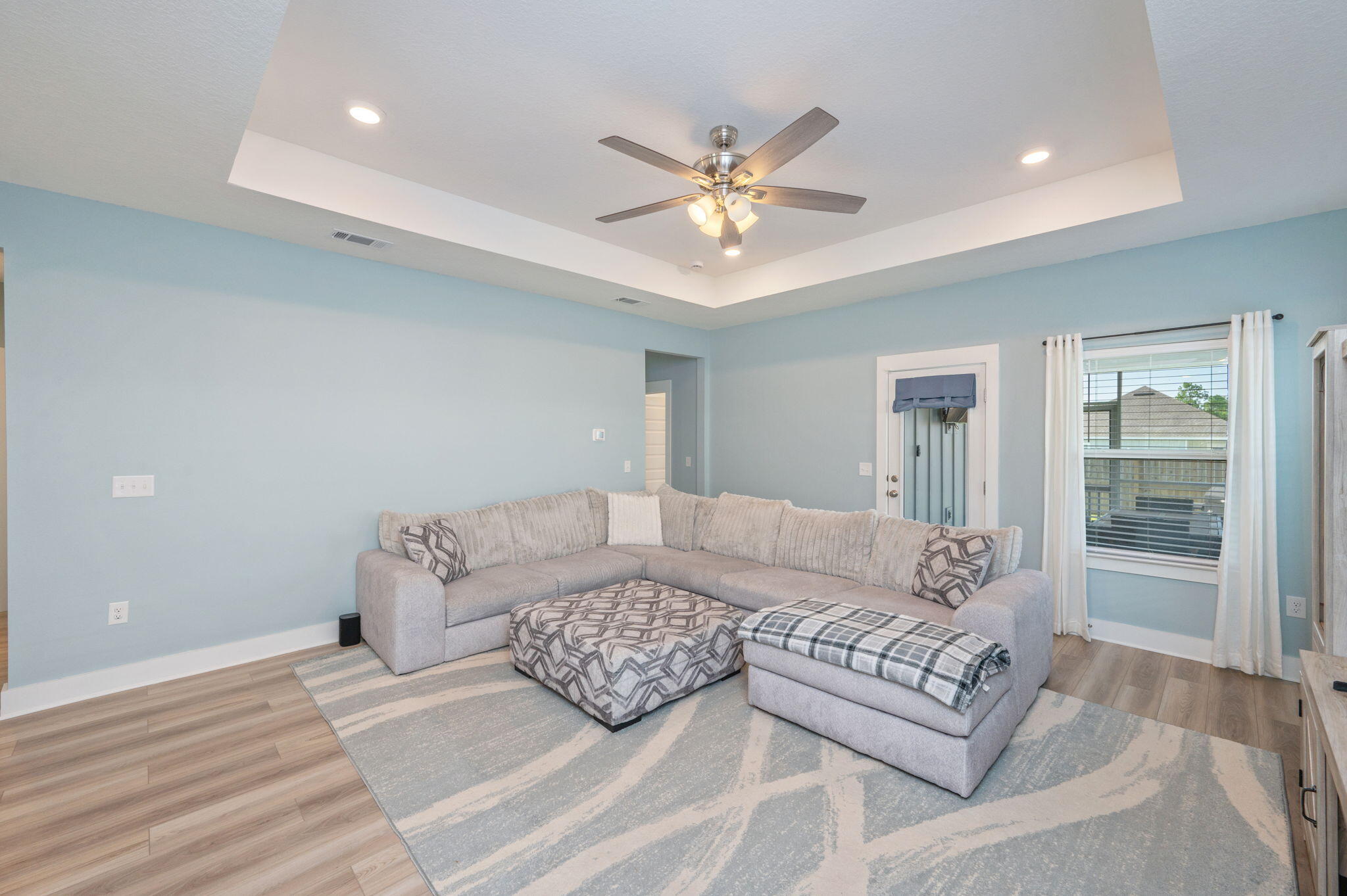 109 Blooming Cove Crestview, FL 32539 - Photo 10 of 42 a living room with furniture and a chandelier