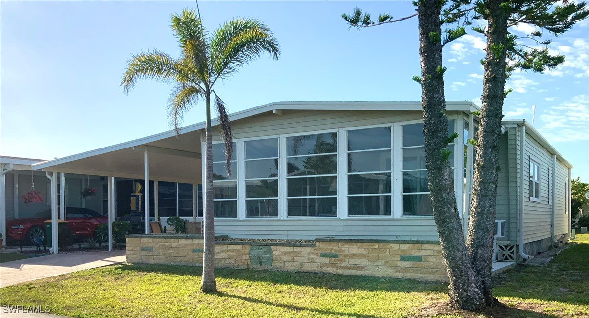 a view of a house with a swimming pool