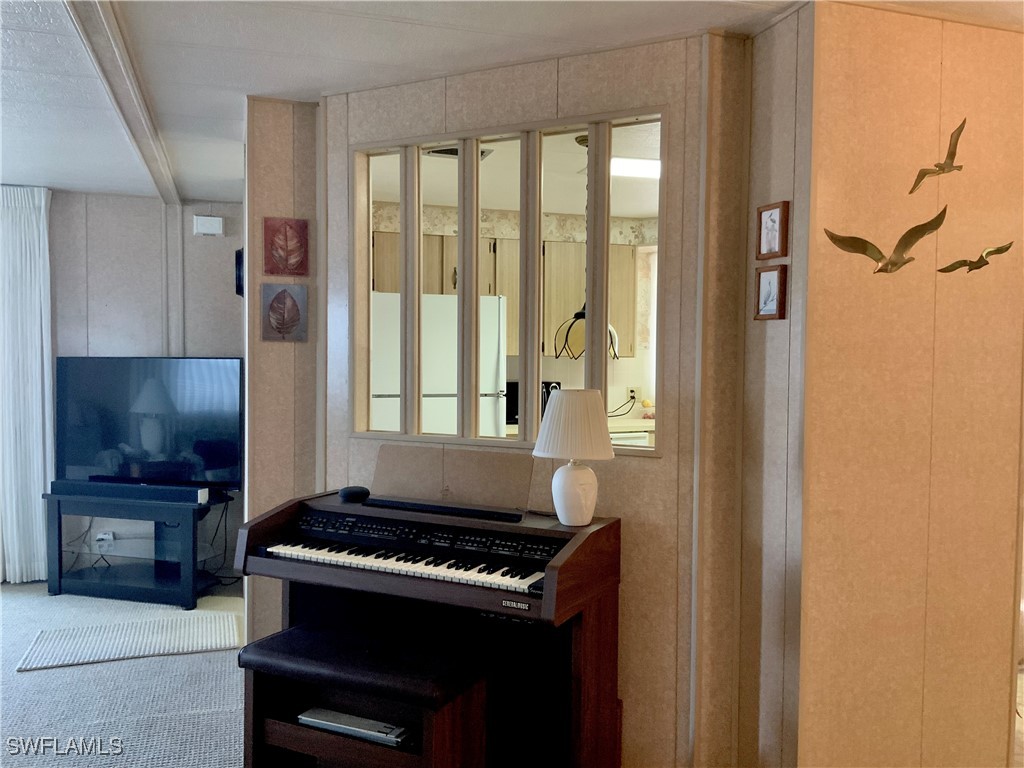 15550 Burnt Store Road, Unit 188 Punta Gorda, FL 33955 - Photo 13 of 37 a kitchen with a stove and a refrigerator