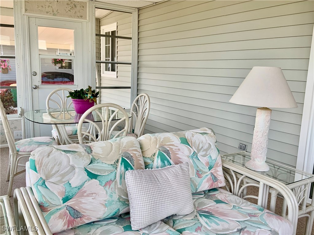 15550 Burnt Store Road, Unit 188 Punta Gorda, FL 33955 - Photo 19 of 37 a view of a dining room with furniture and rug