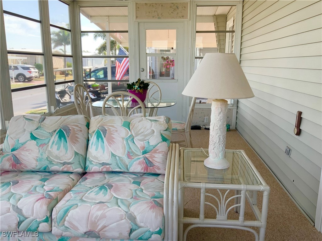 15550 Burnt Store Road, Unit 188 Punta Gorda, FL 33955 - Photo 20 of 37 a living room with furniture