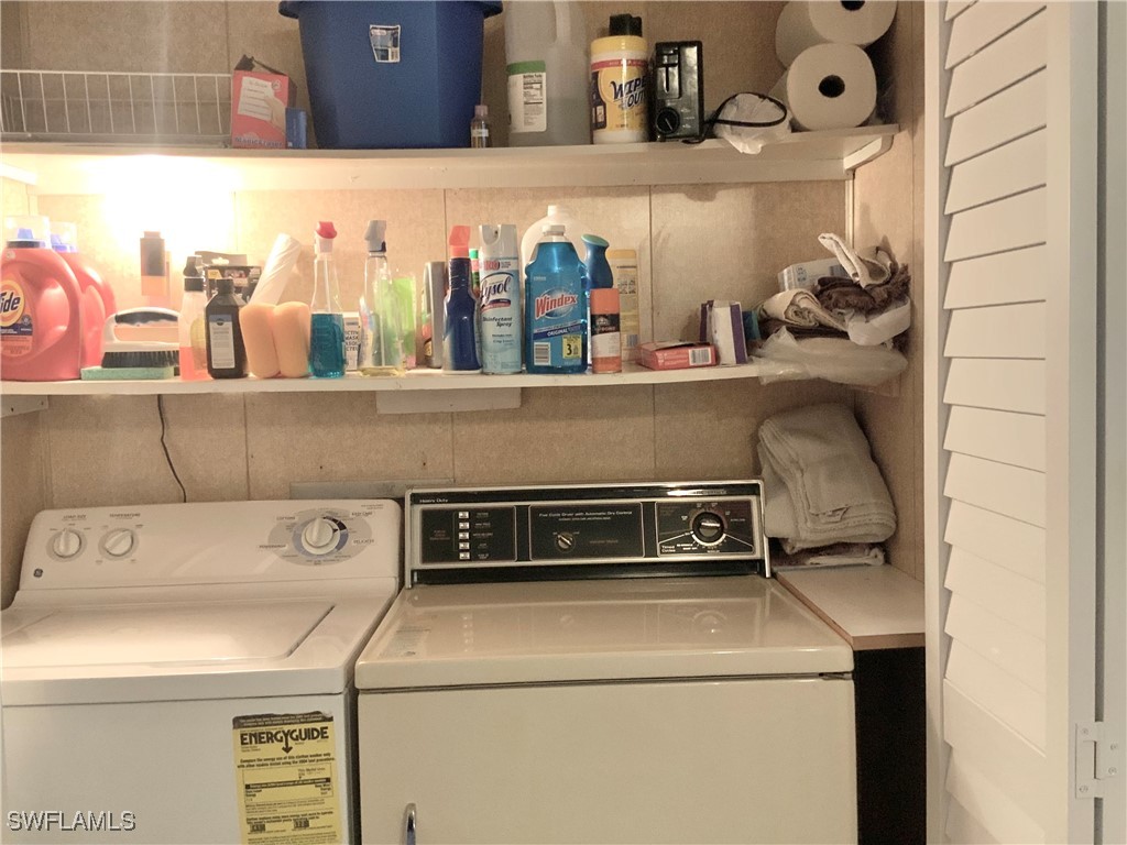 15550 Burnt Store Road, Unit 188 Punta Gorda, FL 33955 - Photo 22 of 37 a close view of laundry room with washer and dryer