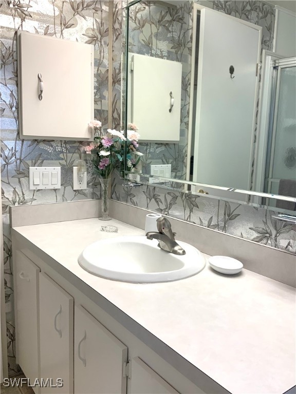 15550 Burnt Store Road, Unit 188 Punta Gorda, FL 33955 - Photo 29 of 37 a bathroom with a sink and a mirror