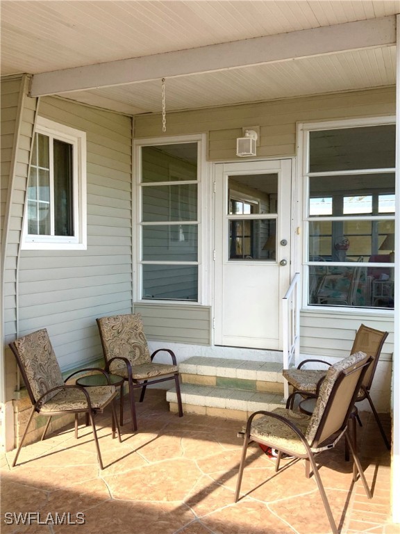 15550 Burnt Store Road, Unit 188 Punta Gorda, FL 33955 - Photo 3 of 37 a view of a house and a lounge chair