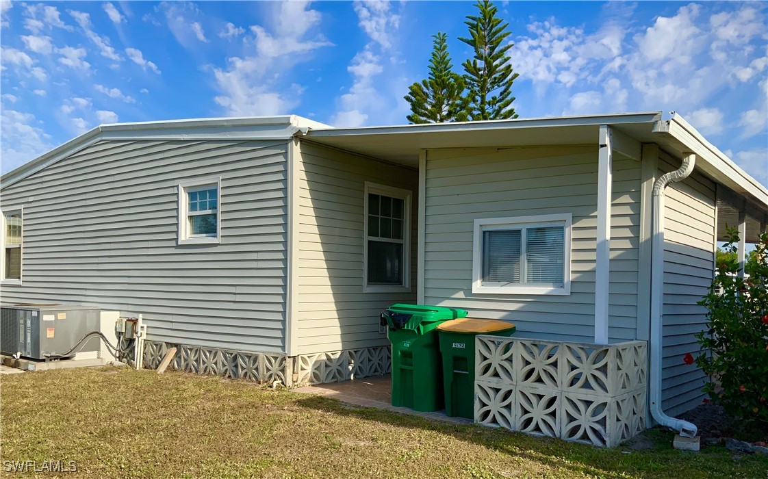 15550 Burnt Store Road, Unit 188 Punta Gorda, FL 33955 - Photo 31 of 37 a front view of a house with plants