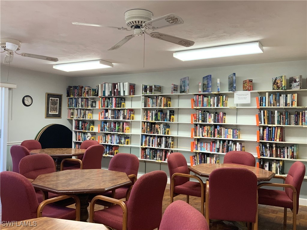 15550 Burnt Store Road, Unit 188 Punta Gorda, FL 33955 - Photo 32 of 37 a view of a livingroom with furniture and a bookshelf