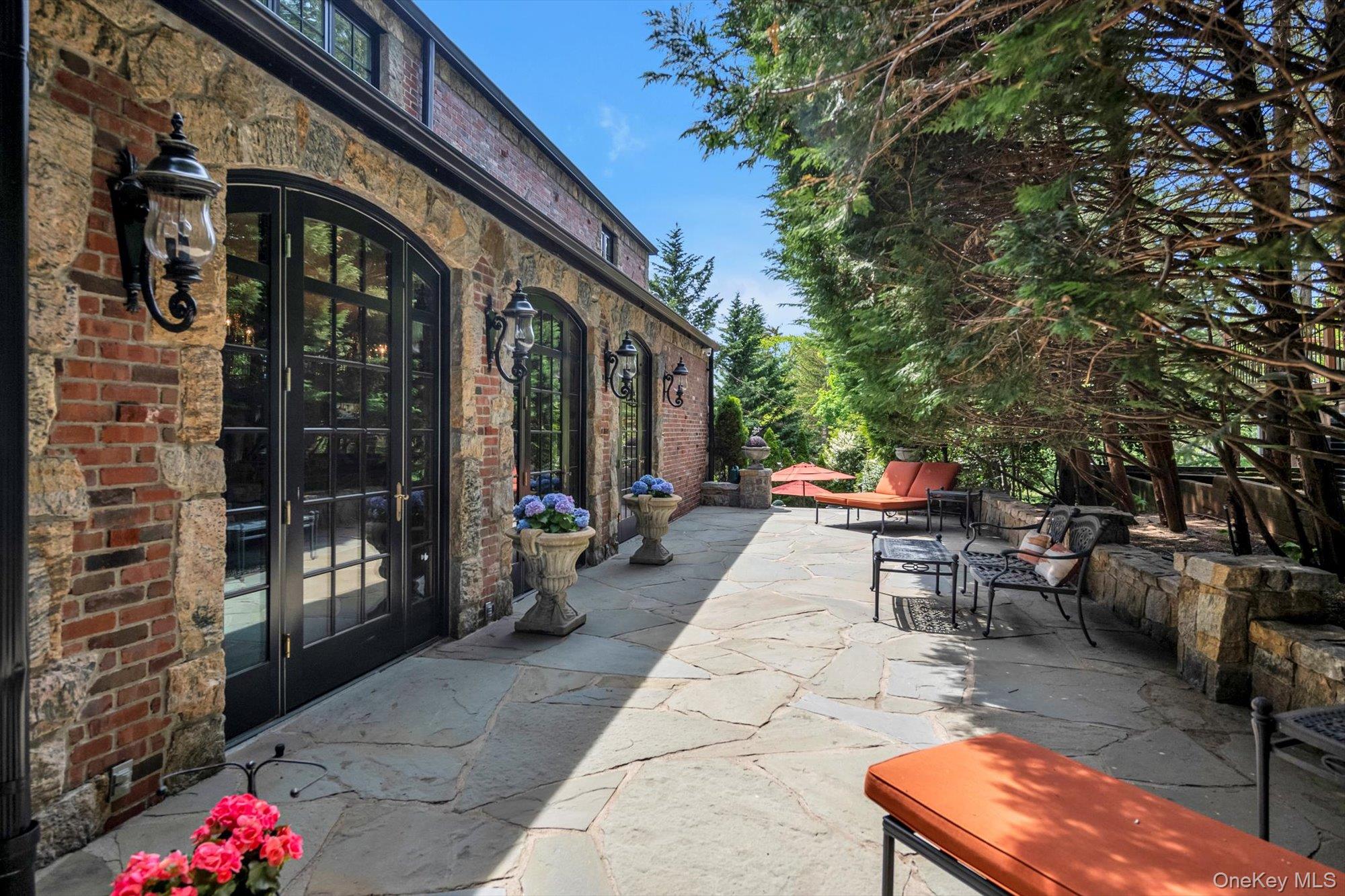 183 Mill Spring Road Manhasset, NY 11030 - Photo 25 of 32 View of bluestone patios / terraces and french doors