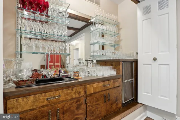 an aerial view of house with yard swimming pool and outdoor seating