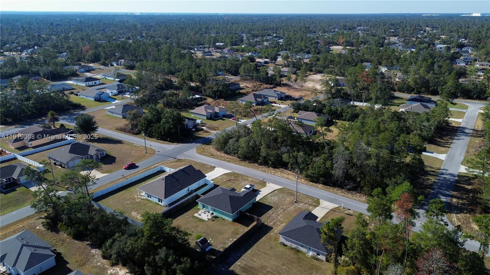 0 Southwest 167th Loop Ocala, FL 34473 - Photo 25 of 31 an aerial view of house with yard