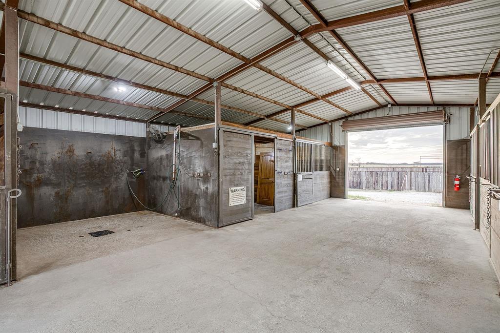 2220 Lazy Bend Road Millsap, TX 76066 - Photo 16 of 36 a view of an empty room with a fireplace