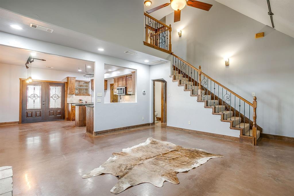 2220 Lazy Bend Road Millsap, TX 76066 - Photo 25 of 36 a view of entryway and hall with wooden floor