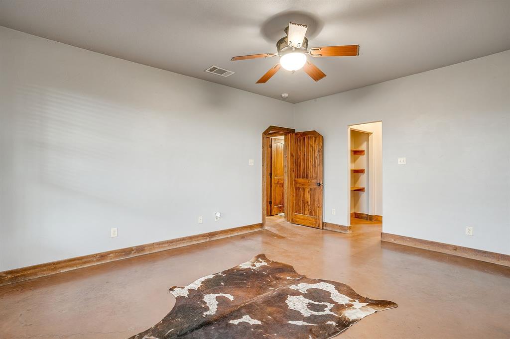 2220 Lazy Bend Road Millsap, TX 76066 - Photo 26 of 36 wooden floor in an empty room with a window
