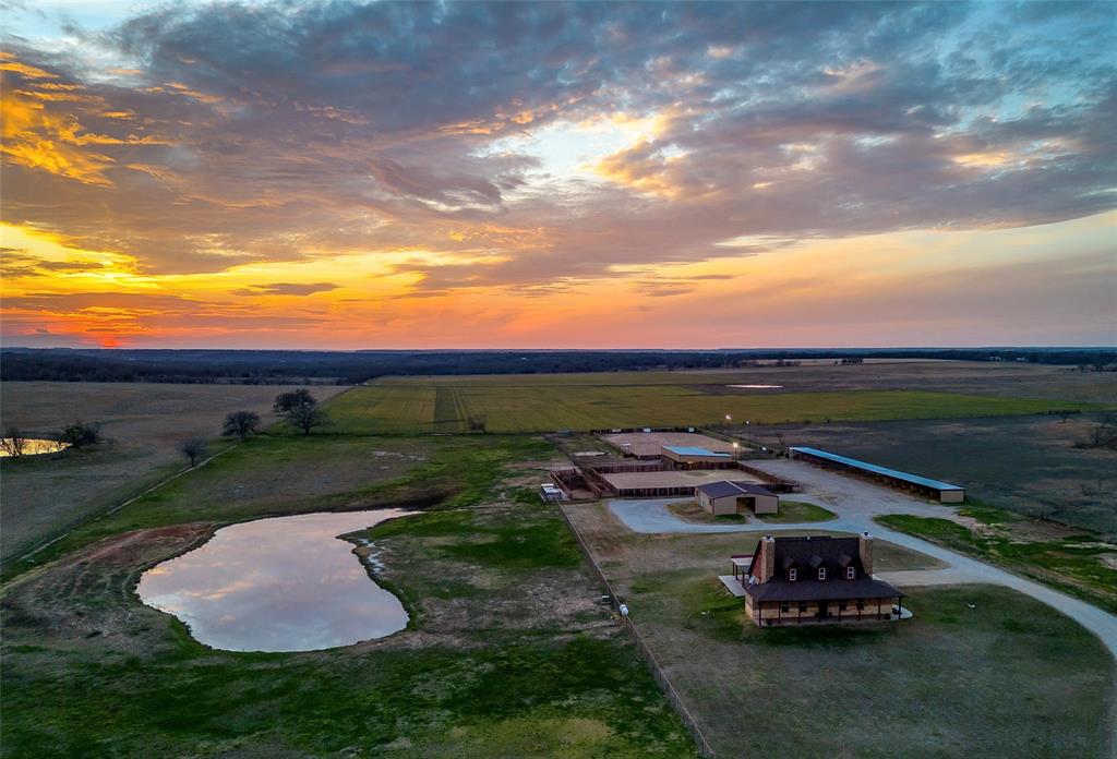 2220 Lazy Bend Road Millsap, TX 76066 - Photo 35 of 36 a view of a swimming pool and lounge chairs in the garden