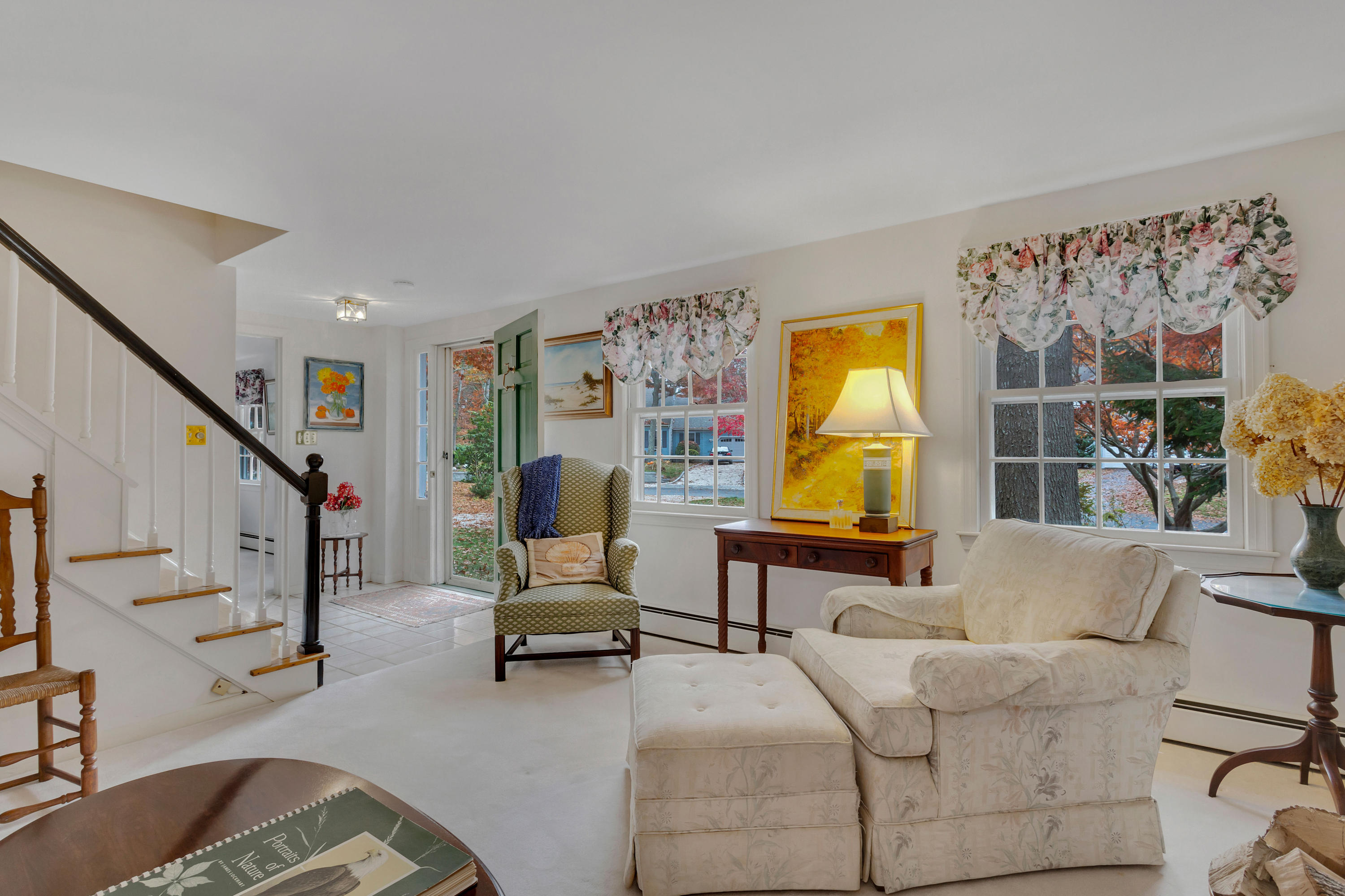 133 Ralyn Road Cotuit, MA 02635 - Photo 4 of 47 a living room with furniture and a flat screen tv