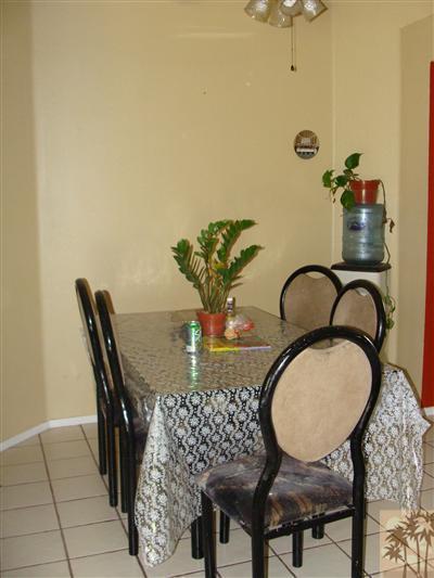 68707 Risueno Road Cathedral City, CA 92234 - Photo 3 of 6 a view of a dining room with furniture and chandelier
