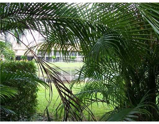 7727 La Mirada Drive, Unit 118 Boca Raton, FL 33433 - Photo 15 of 16 a view of a yard